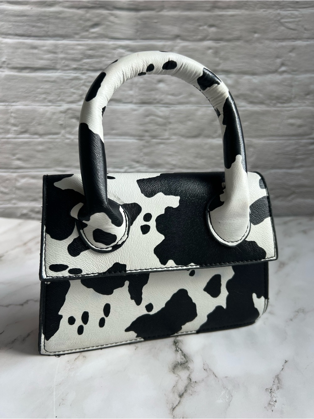Black & White Cow Print Mini Top-Handle Bag